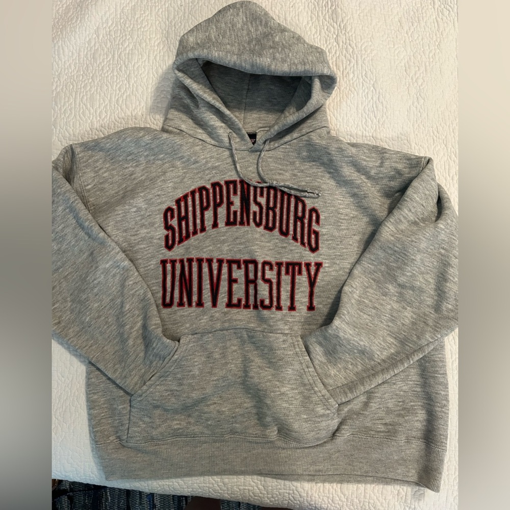 Shippensburg Univ Hooded gray w/black/red letters. Front pouch pkt.Fleece lined.
